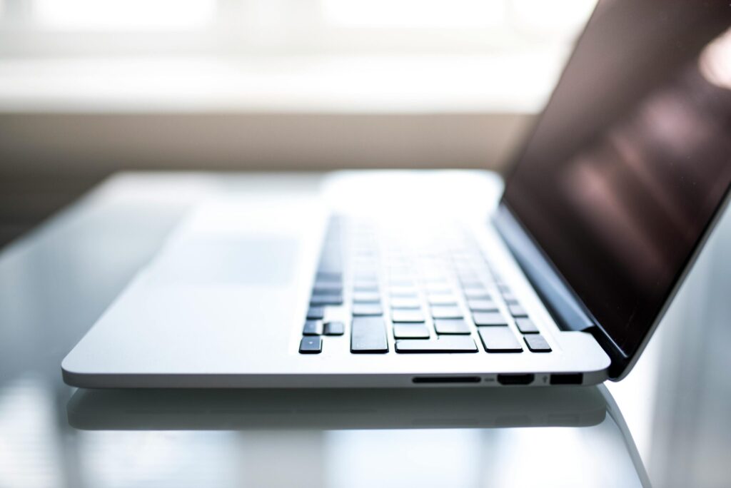 shallow-focus-photography-of-macbook
